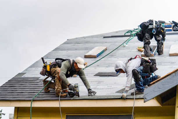 Professional Storm Damage Roof Repair technician working in East Falmouth, MA